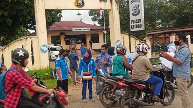 Kapolres Muna Turut Serta Berbagi Nasi Ikan